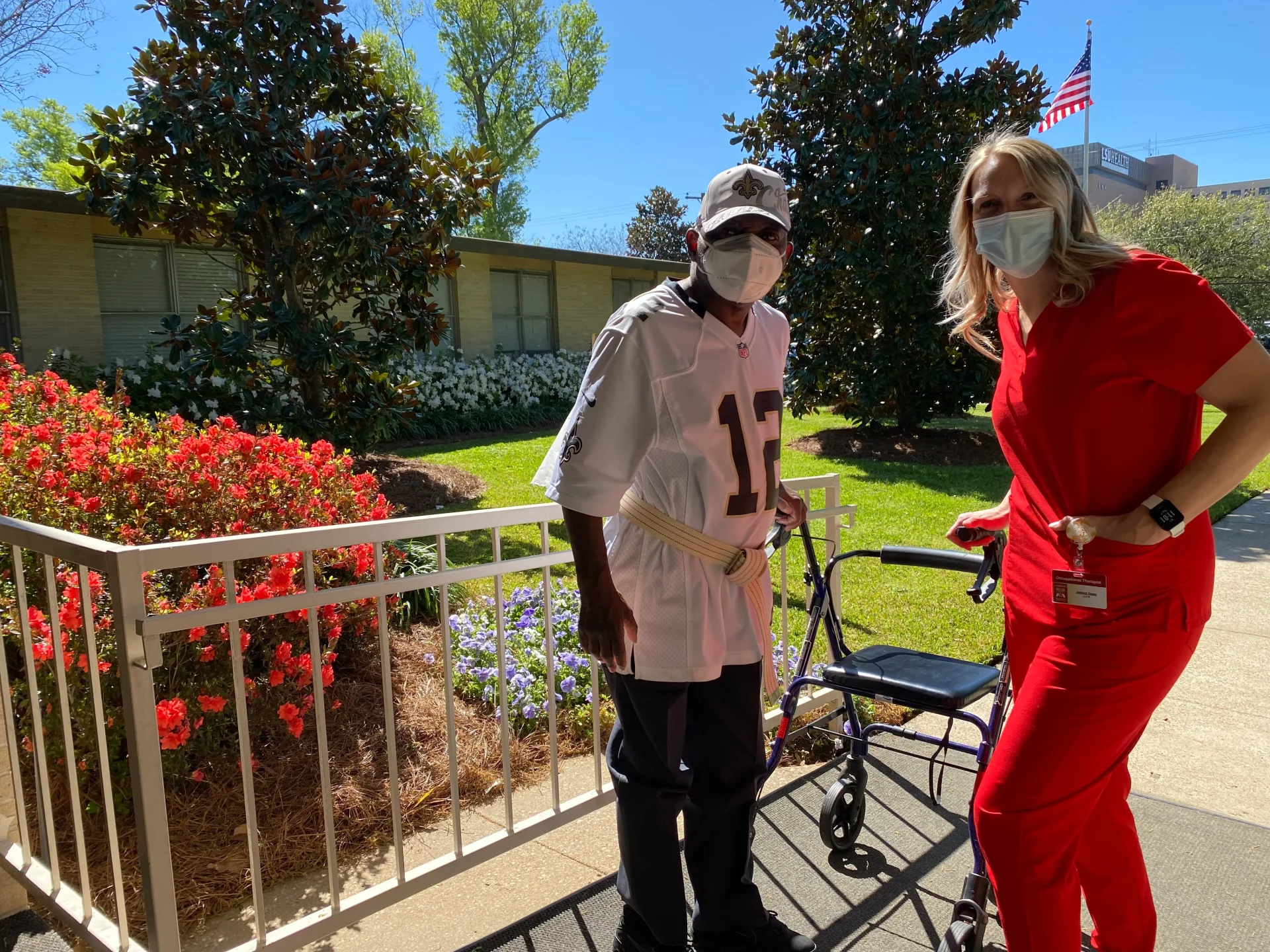 Staff And Patient Standing Outside Image Image
